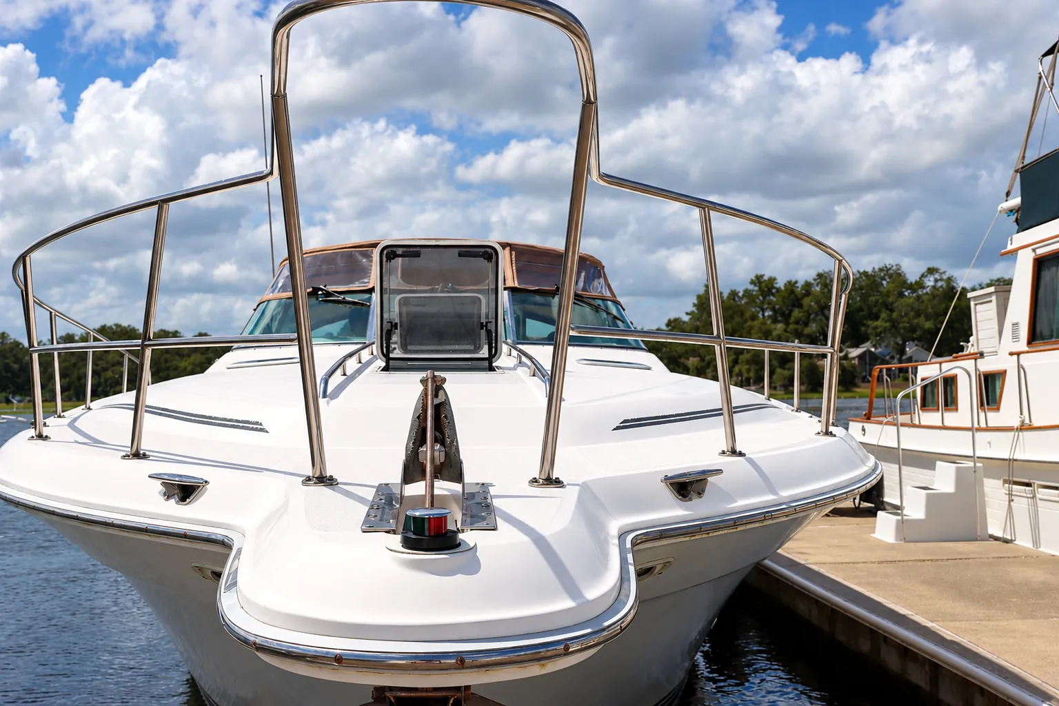 Bow of the 44-foot Sea Ray yacht with stainless steel safety railing