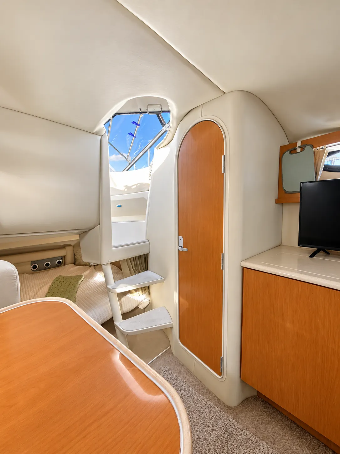 Cabin interior of the 30-foot cruiser looking toward the companionway steps