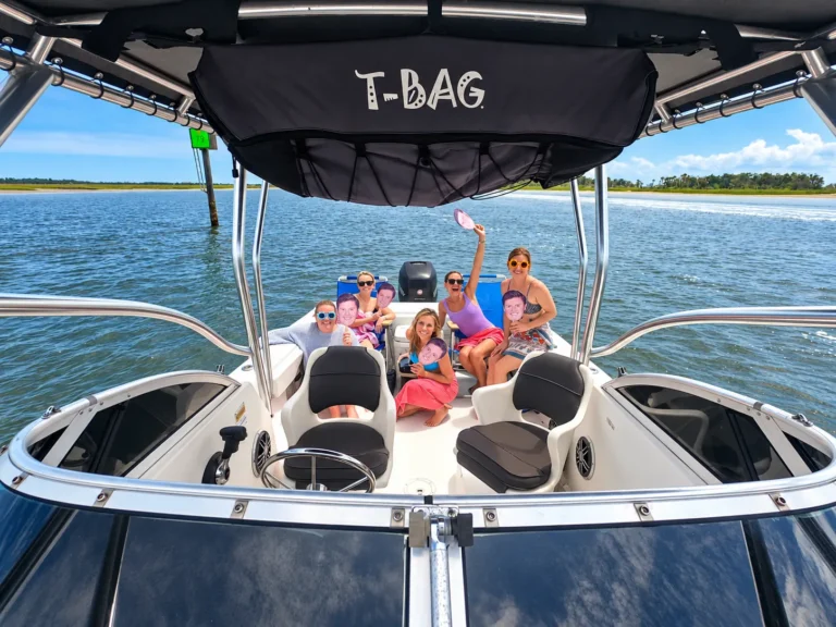 Guests on the bow during a powerboat charter in Jacksonville