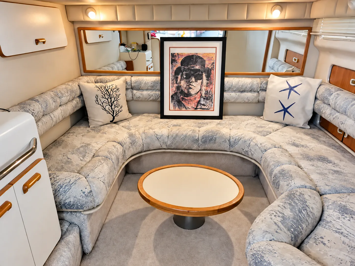U-shaped lounge sofa inside the cabin of the 44-foot Sea Ray yacht