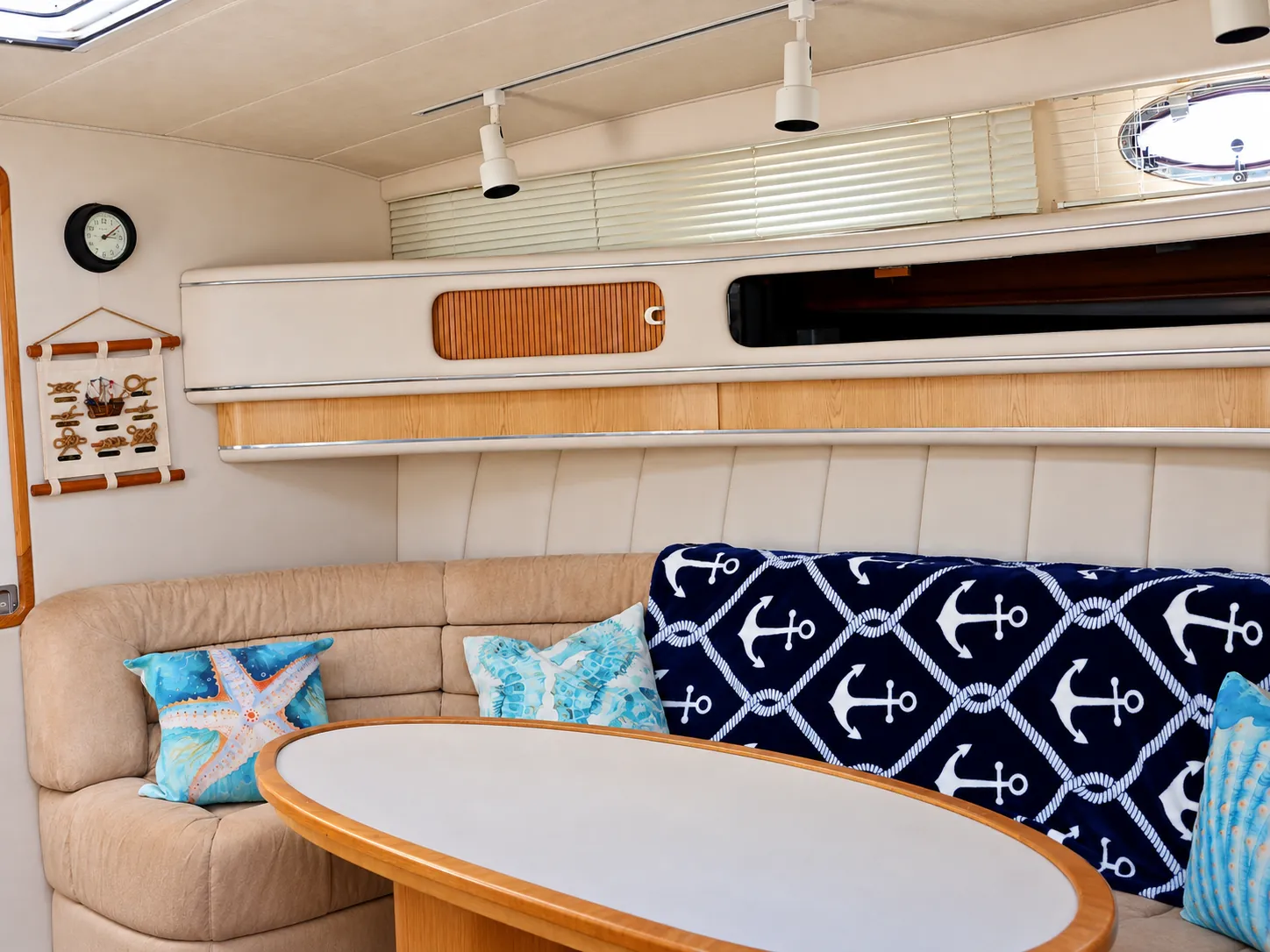 Salon of the 44-foot Sea Ray yacht with sofa seating and coffee table
